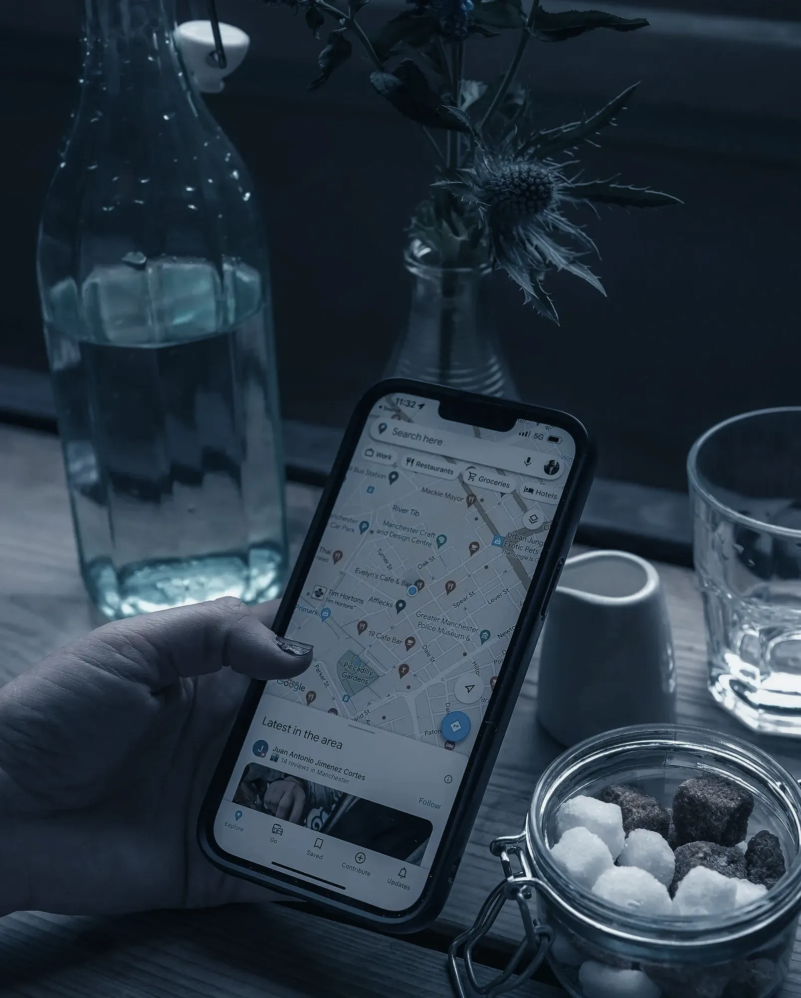 Someone looking up local businesses on a map on their phone